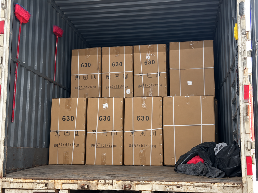 Packed emergency trolley cartons inside a delivery truck